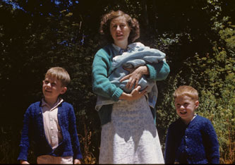 Keith, mother, Roger and me, July 1946