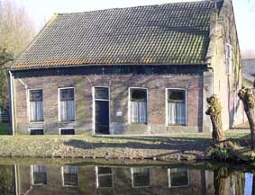 old farmhouse on canal