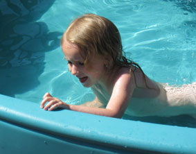 Alie in the wading pool