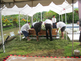 lowering the casket
