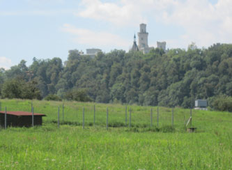 view of Hluboka Castle from along the Vitavou River